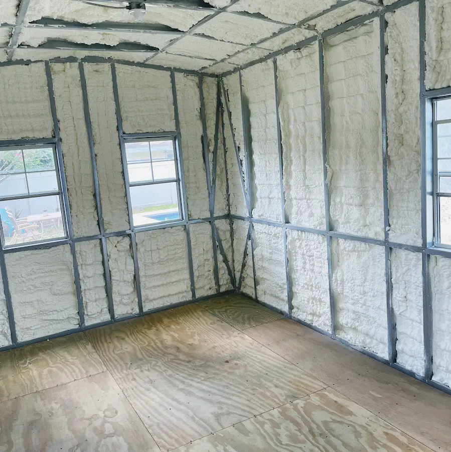 Closed-cell spray foam insulation applied to wall cavities in a residential project in Minnehaha